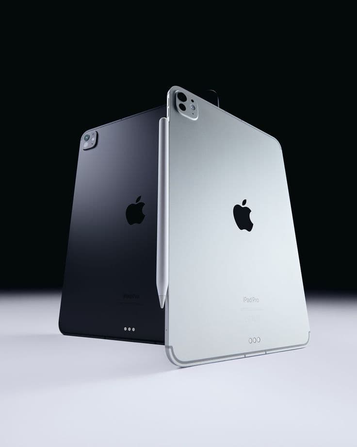 Two iPad Pro devices in a dark studio